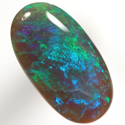 SOLID BLACK CRYSTAL OPAL Rolling flashes of green and turquoise purple fire
